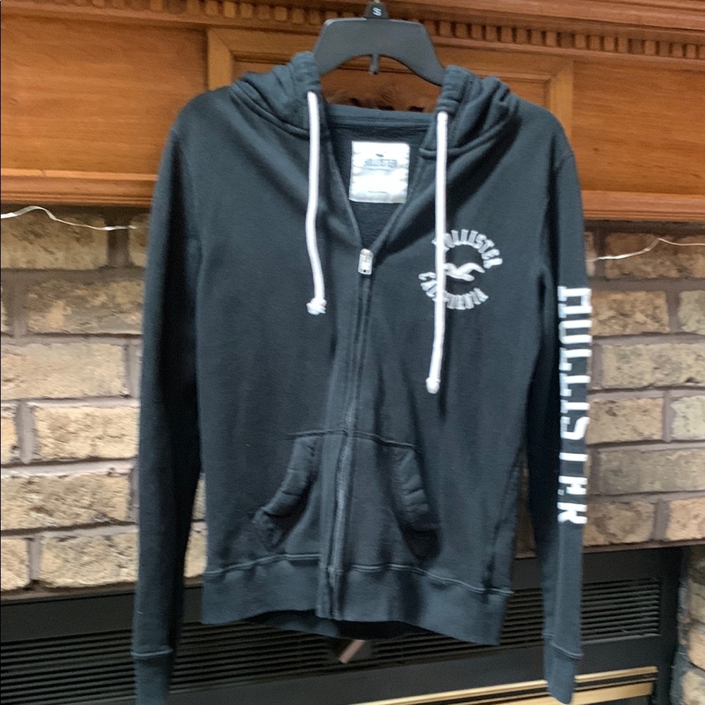 Hollister Black Zip-Up Hoodie with White Logo size small. Great used condition
